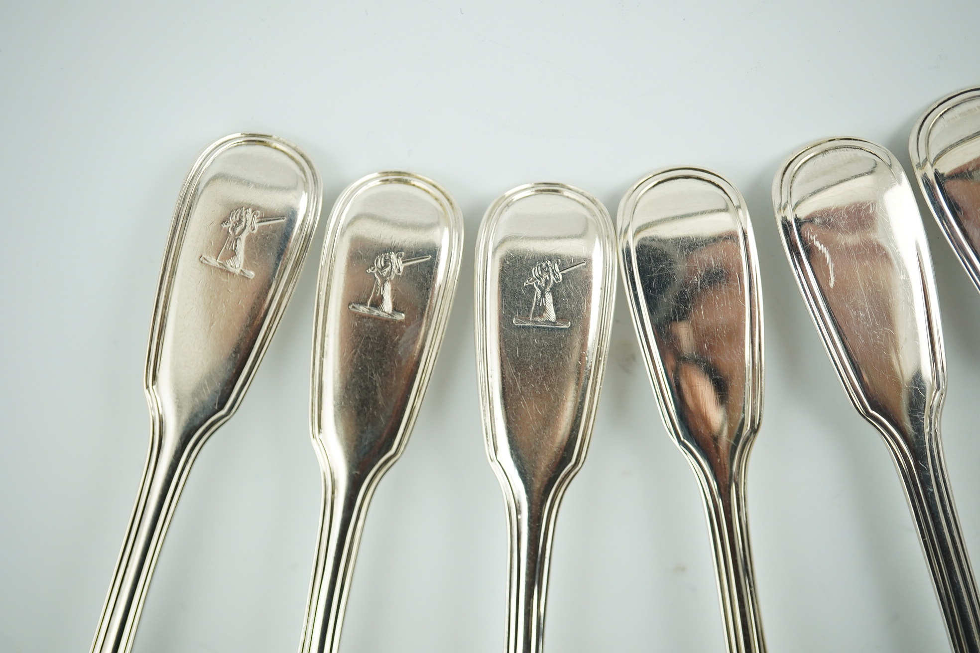 Two sets of six William IV silver fiddle and thread pattern teaspoons, one with engraved crest, William Chawner II, London, 1831 and Mary Chawner, London, 1836